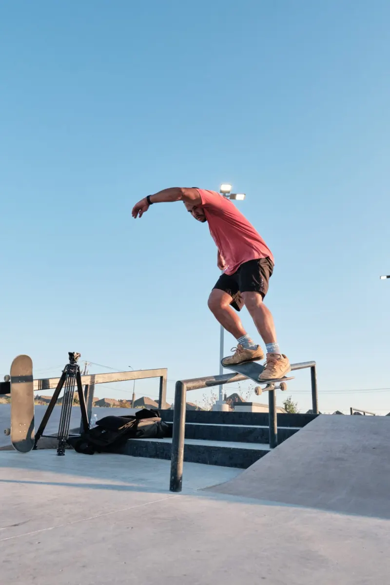Jared riding a rail at golden hour