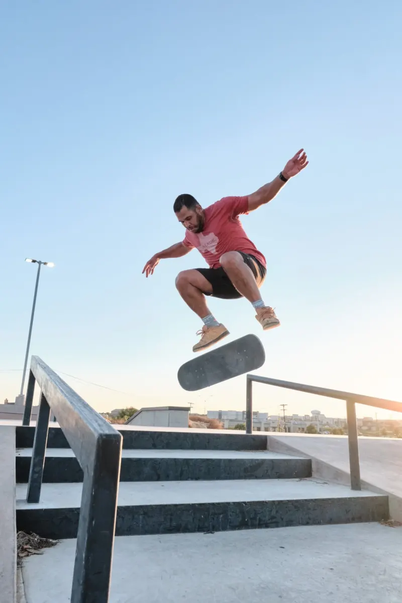 Jared launching off a set of stairs