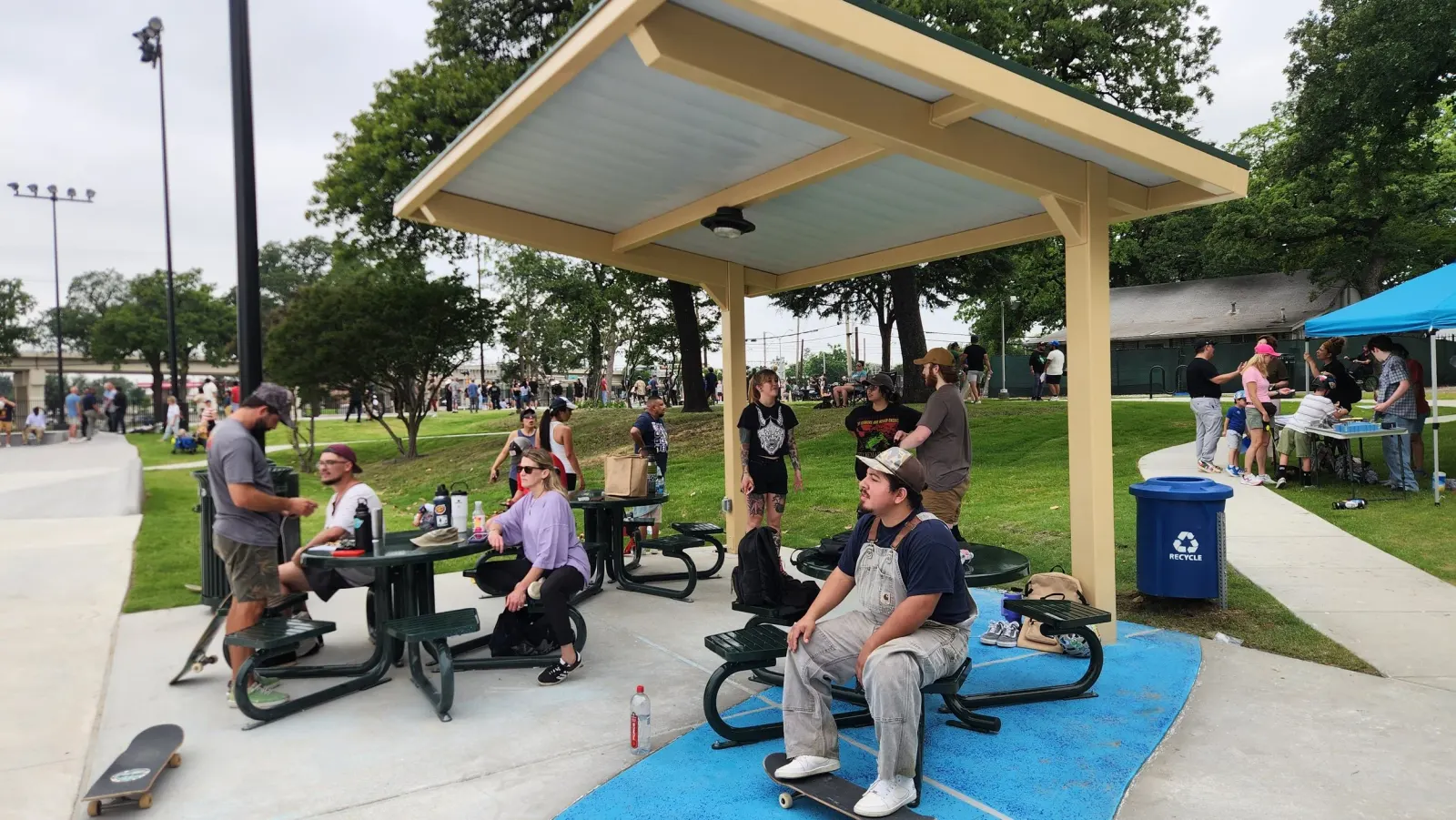 A perfect spring day still needs some shade and rest time. The skatepark is a great place to hang out and enjoy the show