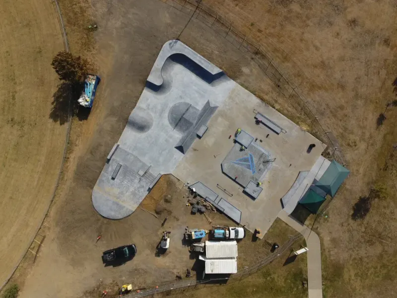 Working with New Line / SPA, The Colony reused its existing concrete slab to gain cost efficiencies, and designed a beautiful park. They were able to expand the park to about 12,000 sqft as part of this redesign, and incorporate local attributes lik…